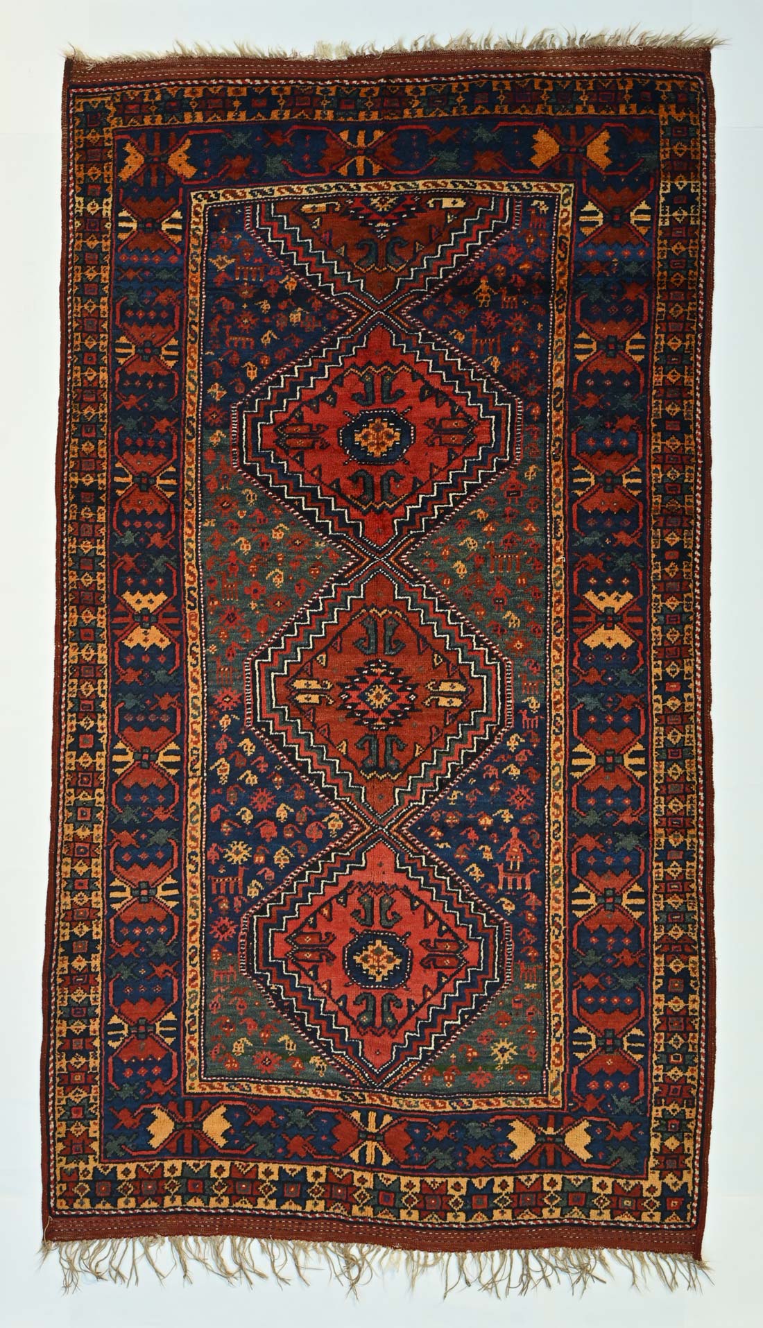 Two Kurdi Rugs by the same weaver.