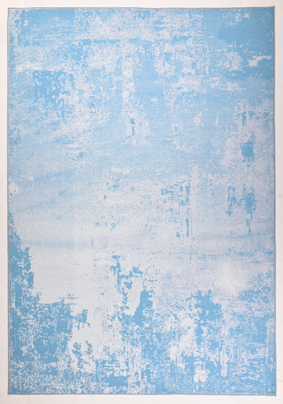 A contemporary modern rug in blue