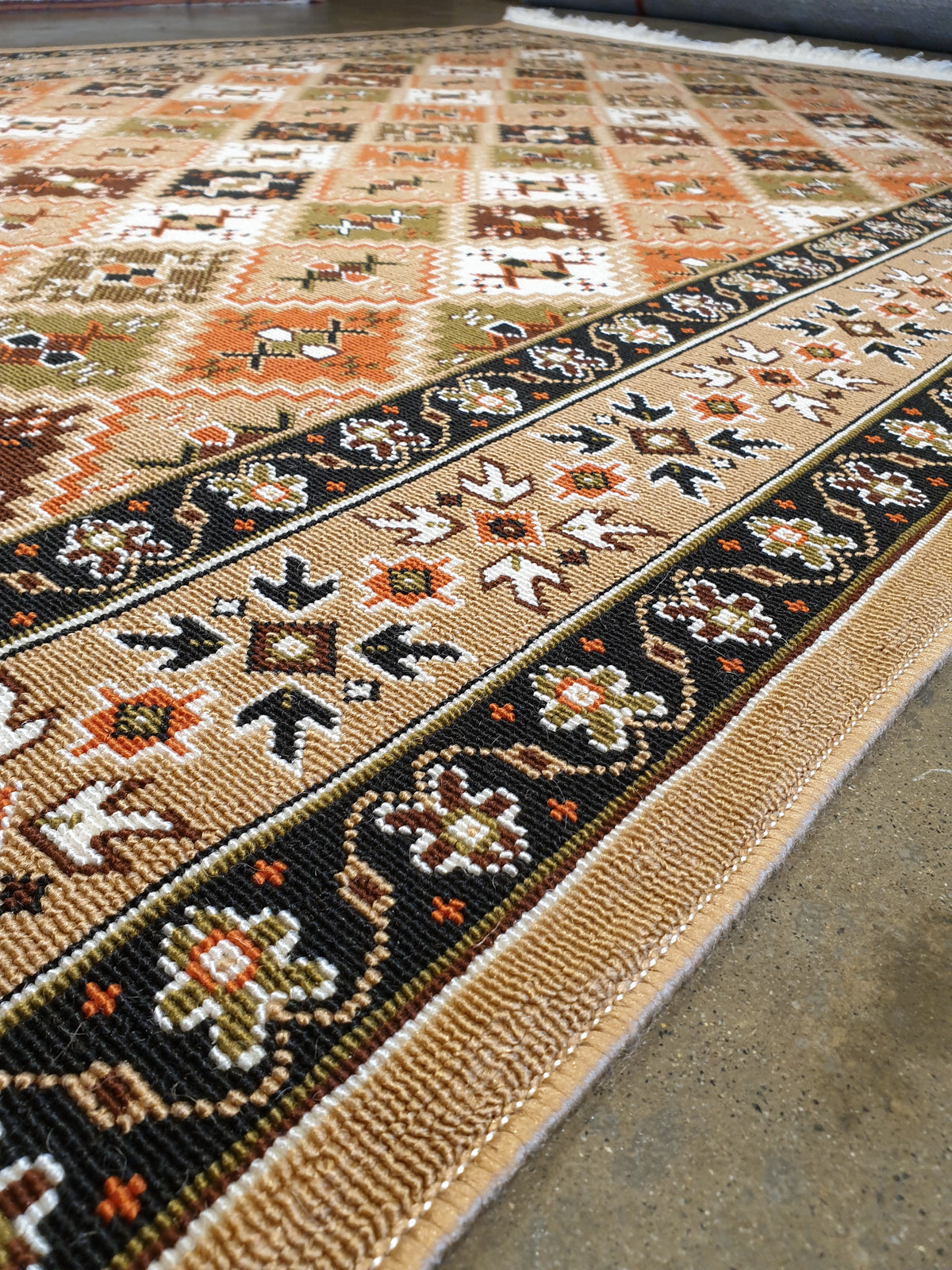 Attractions, a rug in tribal pattern.