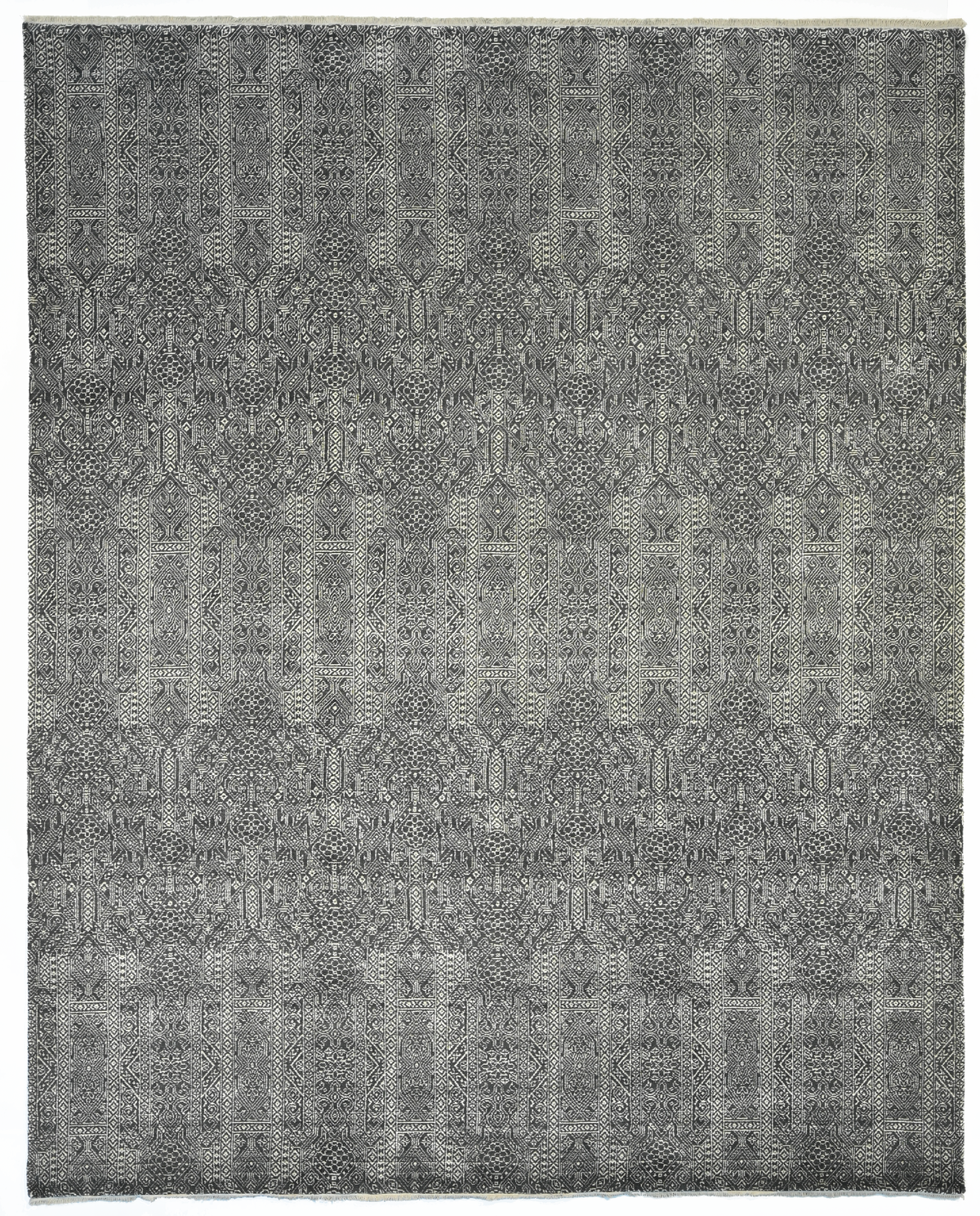 Charcoal fountains; A modern rug.