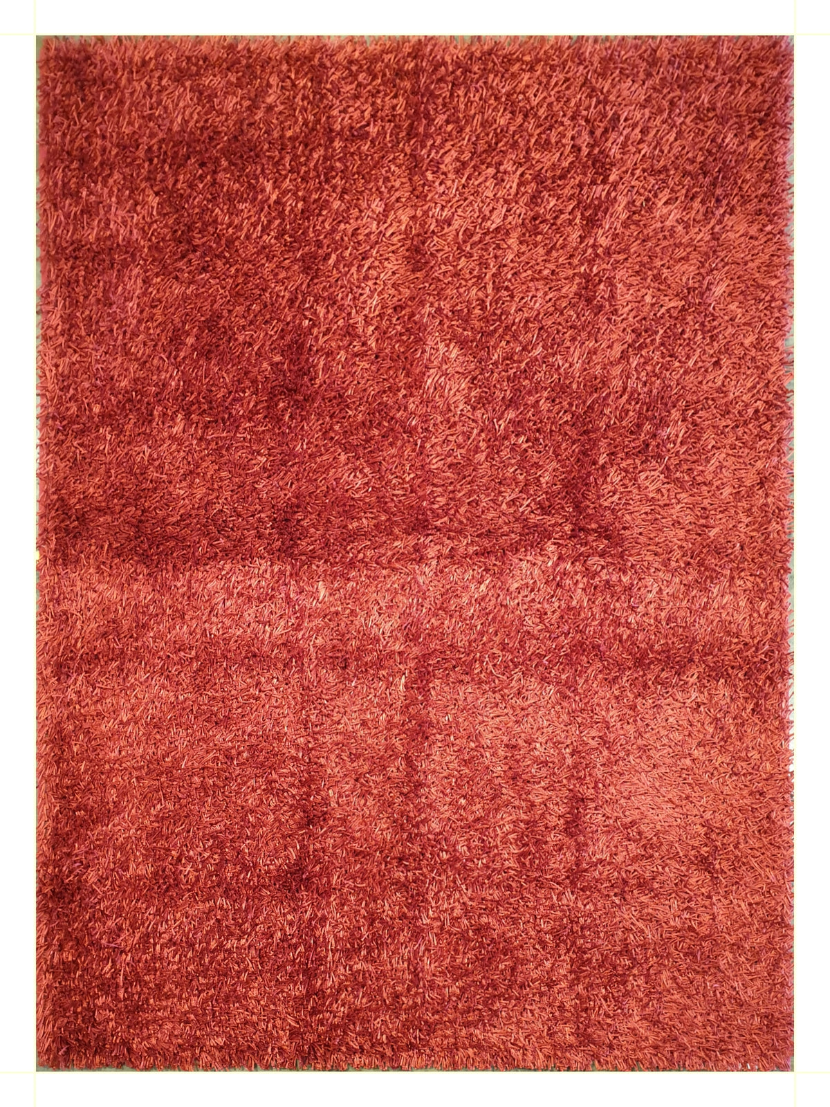 Rouge; a shaggy rug